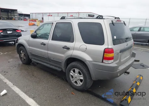 2001 Ford Escape Xlt from USA, damaged, VIN 1FMCU041X1KF31454